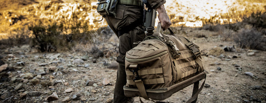 Eberlestock Bang Bang Range Bag loaded with handguns, ammo, and accessories